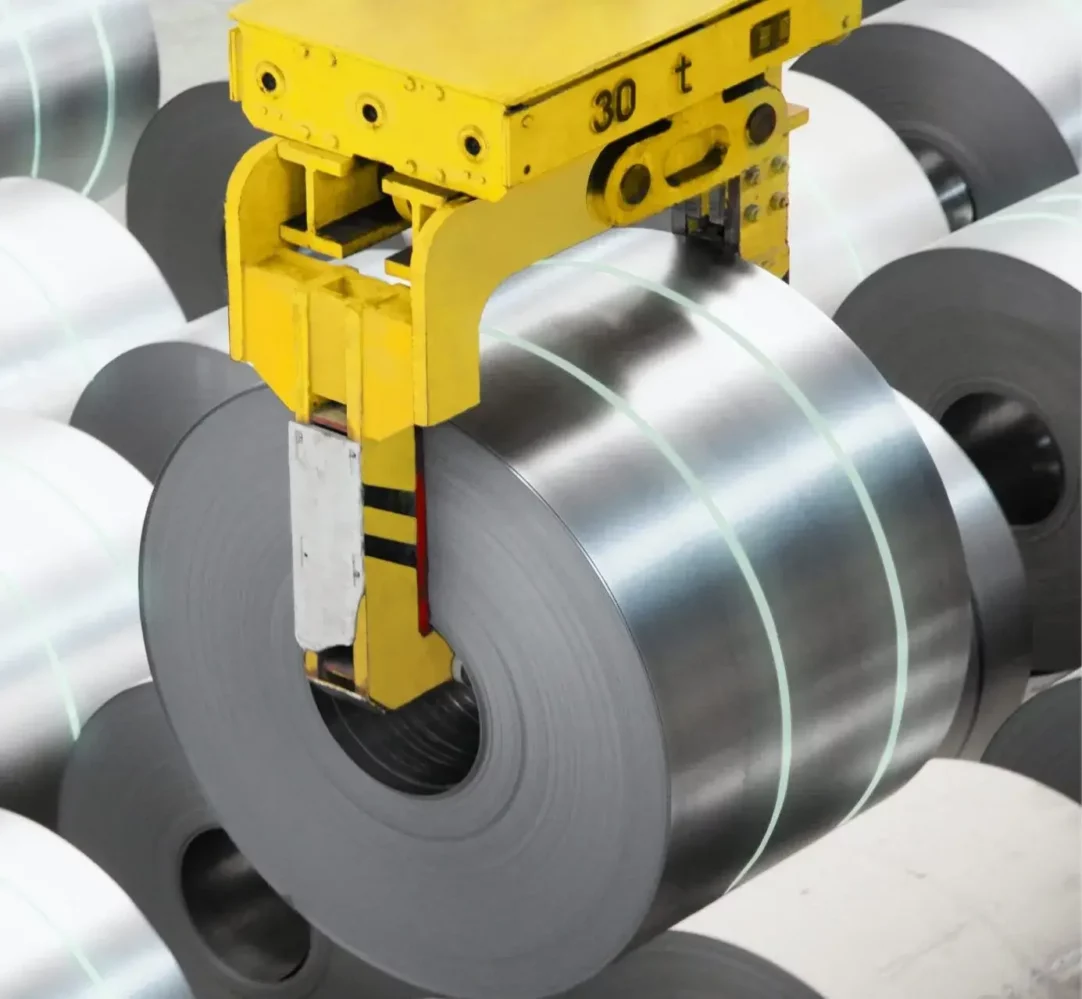 Steel coil in a factory and being moved by a robot. High-strength strapping